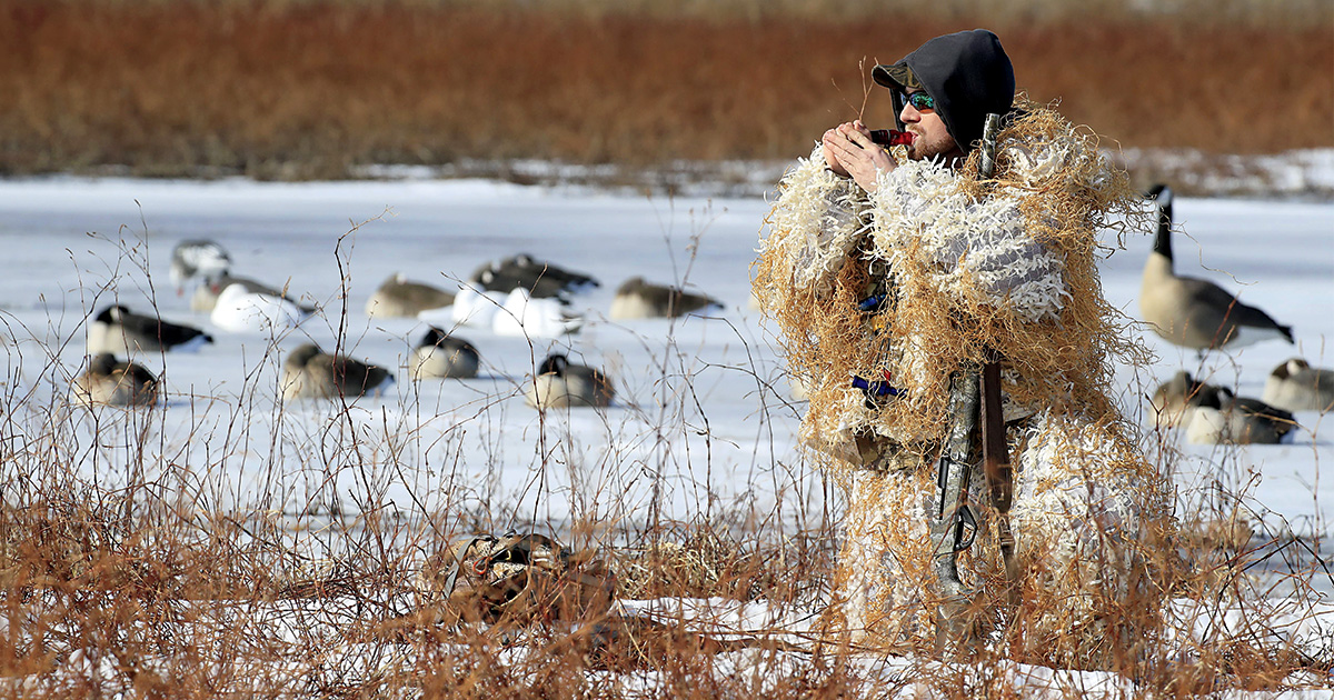 Hunter in ghillie suit. Photo by DougSteinkePhotos.com